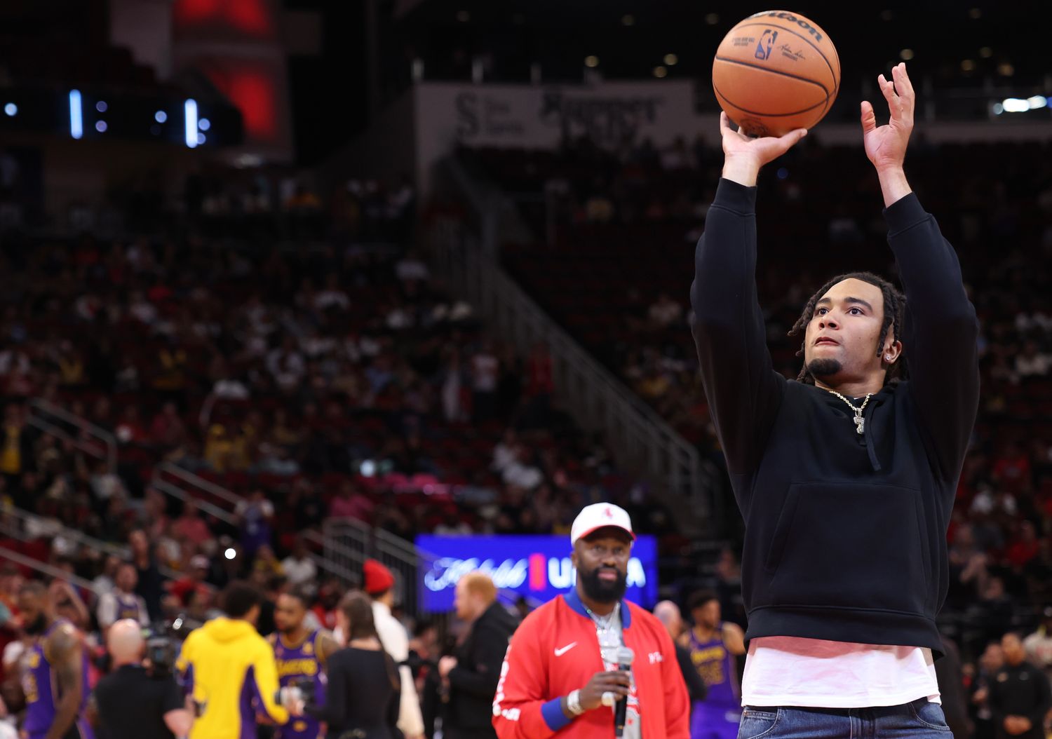Texans quarterback CJ Stroud throws out the first free throw before the Houston Rockets play the Los Angeles Lakers at Toyota Center.